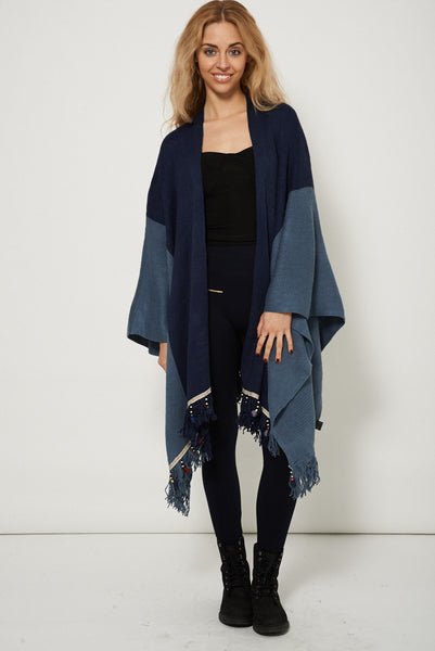 Knitted Poncho With Embellished Hem